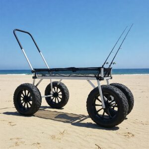 Modern fishing cart with rugged wheels on an empty beach, emphasizing lightweight design and storage efficiency similar to garage wall cabinets. 