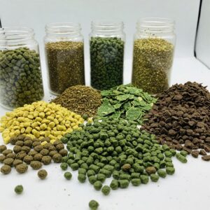 Several goldfish actively feeding on floating fish food in a vibrant aquarium.