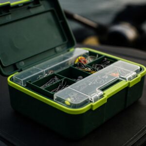 A compact and portable tackle box illustration, perfect for quick fishing trips and carrying essential tackle.