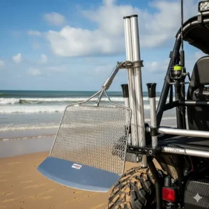A specialized surf fishing rod holder that includes an attachment for holding a sand flea rake, a useful accessory for finding bait.