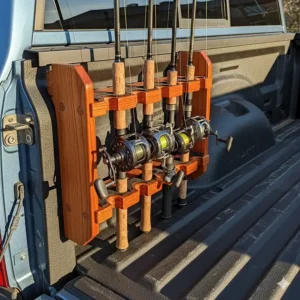 A close-up view of a custom-built fishing rod holder installed in the bed of a truck, keeping fishing rods organized and safe during transport.
