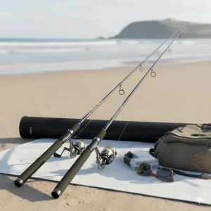 A two-piece surf fishing rod disassembled for travel, showing how easily these long rods can be transported for different fishing trips.