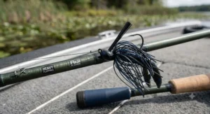 Close-up of a weedless bass jig hooked to a high-power flipping combo bass fishing rod