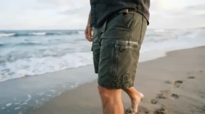 Close-up of functional pockets on fishing shorts for surf fishing, ideal for holding tackle on the shore.